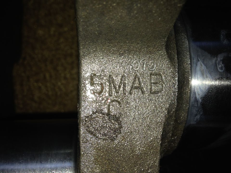 Engine part with casting numbers 5MAB 010