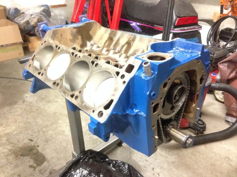 1979 Ford Bronco - Engine block on stand with timing chain visible. Supermotors.net logo in lower right corner.