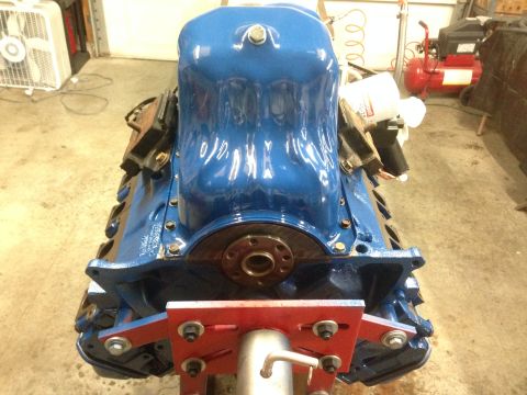 1979 Ford Bronco - Engine rebuild in progress, showing the blue painted engine block mounted on a stand.