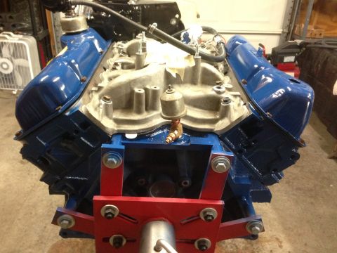 1979 Ford Bronco - V8 engine on a stand, likely undergoing rebuild or assembly.