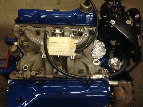 1979 Ford Bronco - Engine intake manifold with "Performer 400" text, taped section, and aluminum foil details.