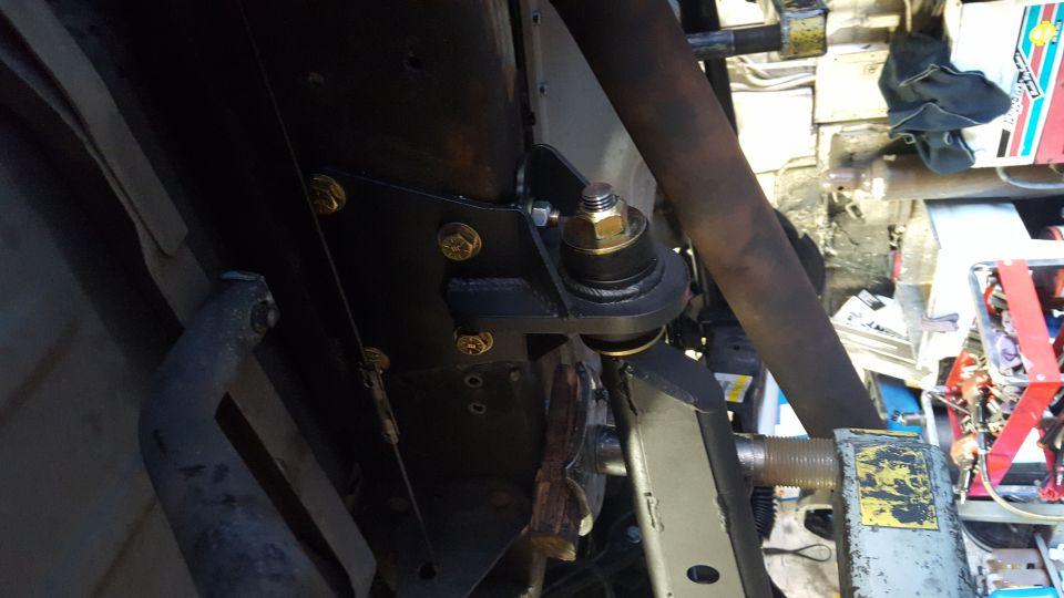 Radius arm brackets. Took 3 drill bits just to make the new mounting holes.