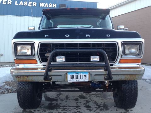 1979 Ford Bronco - This 1979 Ford Bronco features a prominent bull bar and a custom Iowa license plate.