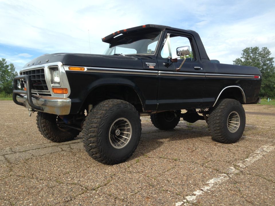 Black 1979 Ford Bronco with lifted suspension and large tires