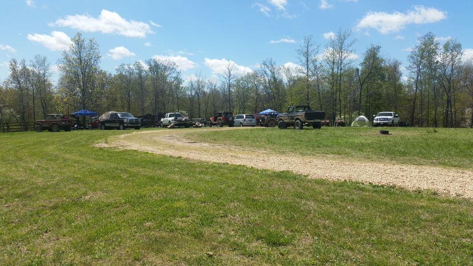 Brown 1978 Ford Bronco parked on a grassy field