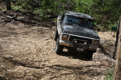 1979 Ford Bronco - This 1979 Ford Bronco is shown tackling a challenging off-road course.