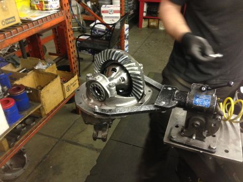 1979 Ford Bronco - Differential gear assembly being worked on in a shop environment.