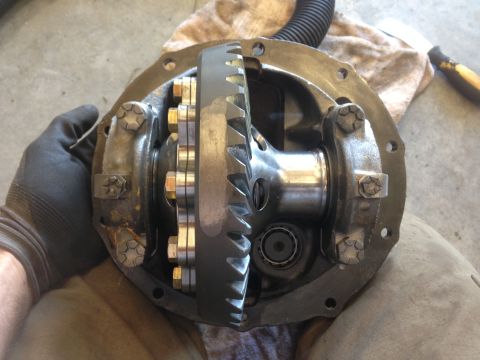 1979 Ford Bronco - Close-up of a vehicle differential assembly, showing the internal gears and housing.