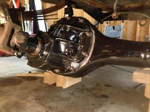 1979 Ford Bronco - Close-up of a vehicle's rear axle and differential assembly, appearing freshly painted.