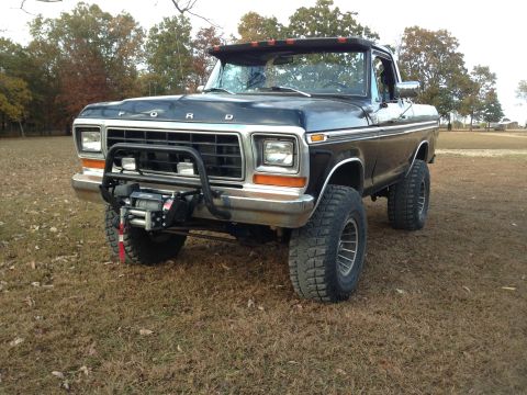 1979 Ford Bronco - This 1979 Ford Bronco is equipped with a winch and brush guard, ready for off-road adventures.