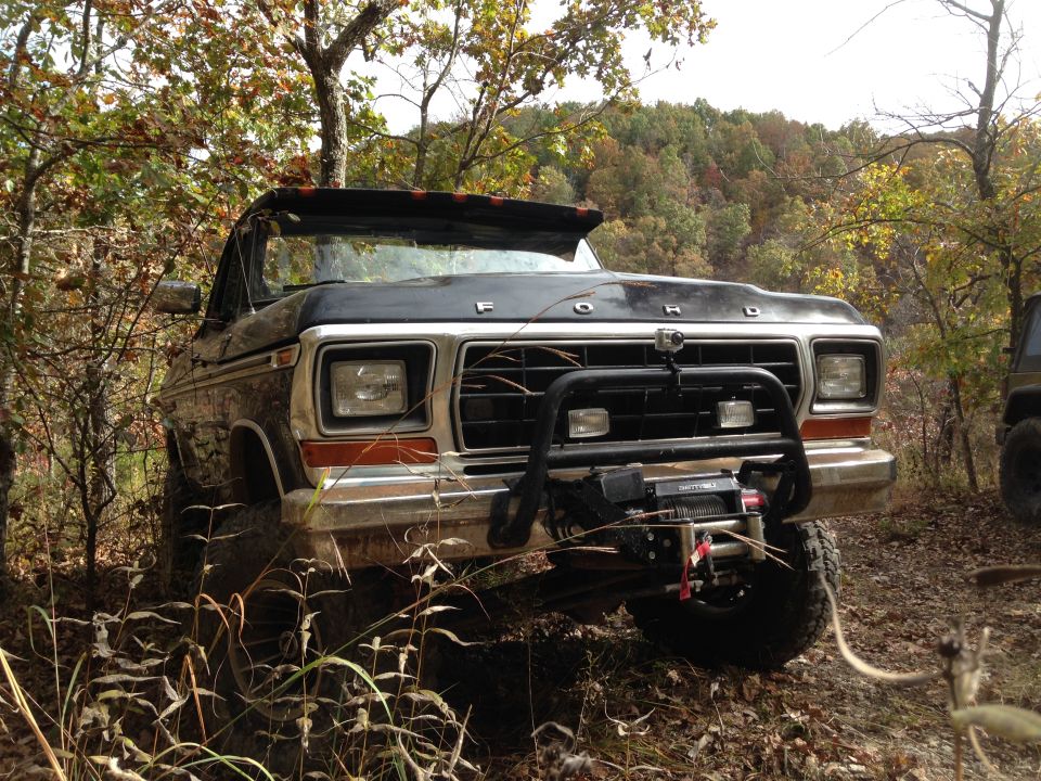 Black 1979 Ford Bronco with winch and brush guard off-road
