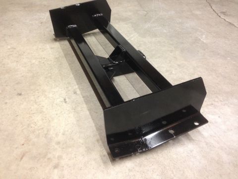 1979 Ford Bronco - Black metal winch mount assembly shown on a concrete floor.