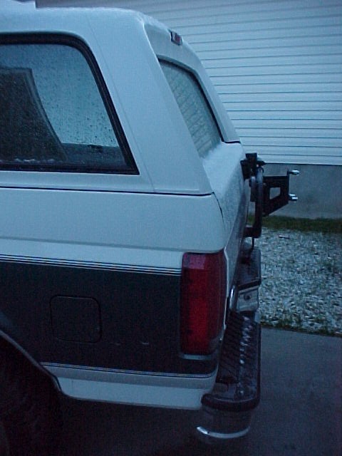 1996 Ford Bronco - This Ford Bronco, viewed from the rear, has a distinctive body style and a spare tire carrier.