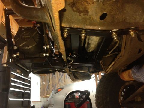 1979 Ford Bronco - Undercarriage view showing a winch mount installation with visible hardware and frame components.