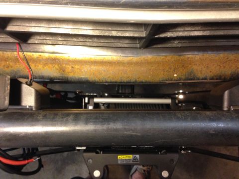 1979 Ford Bronco - Close-up view of a winch mount assembly, showing wiring and caution label.