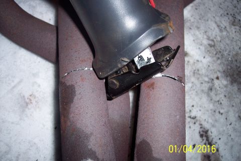 1973 Ford F-250 - A reciprocating saw is cutting through a rusty exhaust manifold pipe. The date "01/04/2016" is visible in the lower right corner.