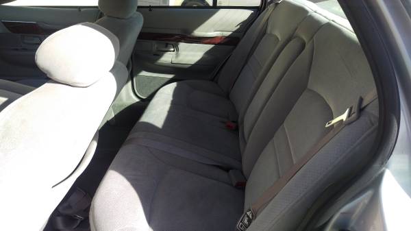 Cloth rear bench seat interior of a sedan