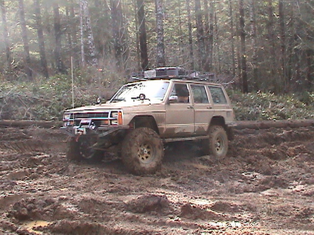 Kevin plays in the mud, almost getting stuck but comes out of it.