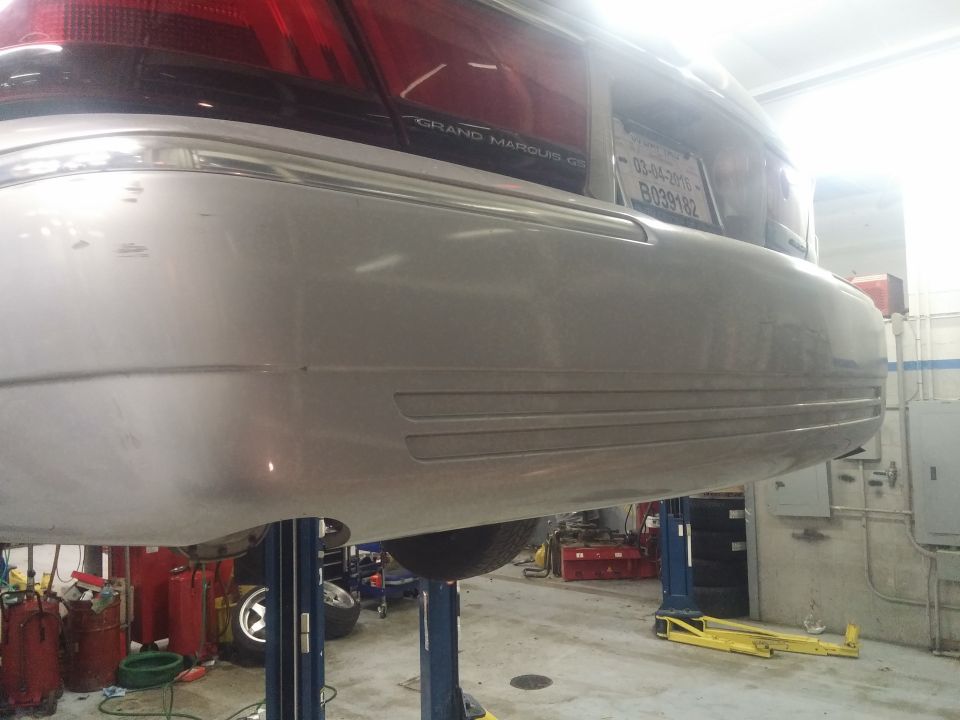 Photo of rear bumper of a Grand Marquis on a lift