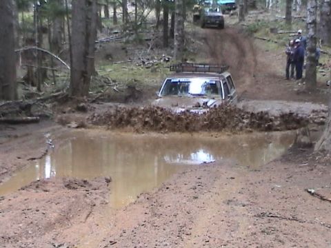 1994 Ford Explorer - Ken's tractor pushing the water