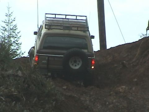 1994 Ford Explorer - Ken having just a bit of trouble getting over the top of Powerline, after taking a different line he makes it over the top.