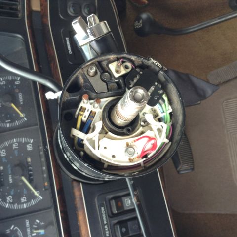 1991 Ford Bronco - This is a close-up view of the steering column assembly of a 1991 Ford Bronco. The ignition switch and wiring harness are visible, along wi…