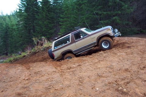 1996 Ford Bronco - Ken making it up the steep hill on powerline trail. (2/21/2004)