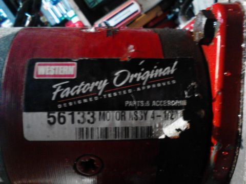 1973 Ford F-250 - A close-up of a red and black label on a vehicle part, likely a motor. The label reads "WESTERN Factory Original DESIGNED-TESTED-APPROVED 5…