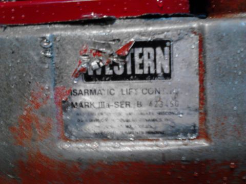 1973 Ford F-250 - A close-up view of a metal data plate on a vehicle, showing the brand name "WESTERN" and model information including "SARMATIC LIFT CONTROL…