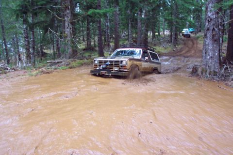 1996 Ford Bronco - And creating a tsunami as he searches for traction on the way out. (2/21/2004)