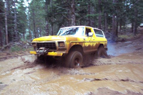 1996 Ford Bronco - The mother of all tsunami's as Steve clears the mud hole (literally). (2/21/2004)