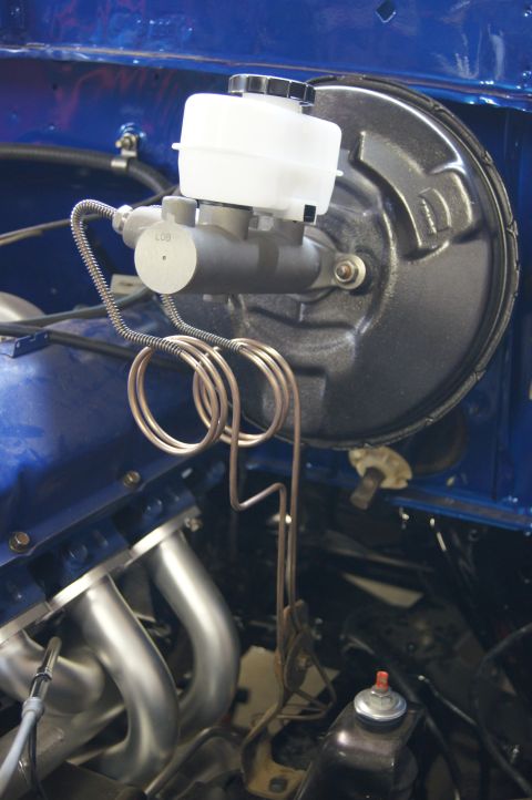 1979 Ford Bronco - Bent up custom lines to go from master cylinder to brake switch . Now we just need brake fluid.