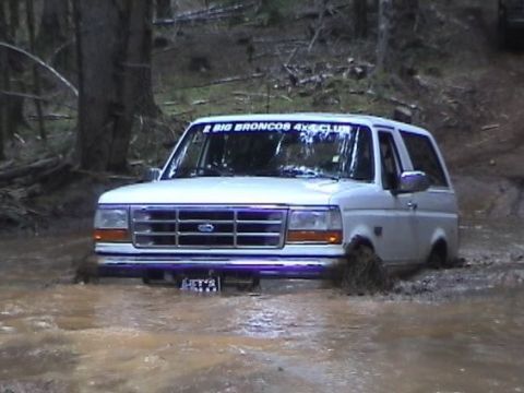 1996 Ford Bronco - Crawling through the middle. (By Anne) (2/21/2004)