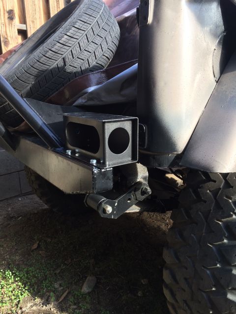 1987 Suzuki Samurai - Photograph of a fabricated rear hitch mount, not a technical document.