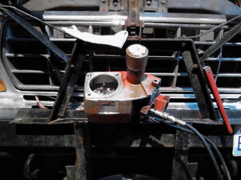 Front of a truck with a hydraulic winch mechanism mounted