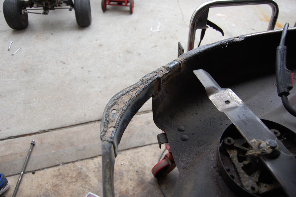 Mower deck with blade and welded frame