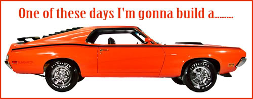 Orange 1969 Ford Torino with black stripes and spoiler, text above.