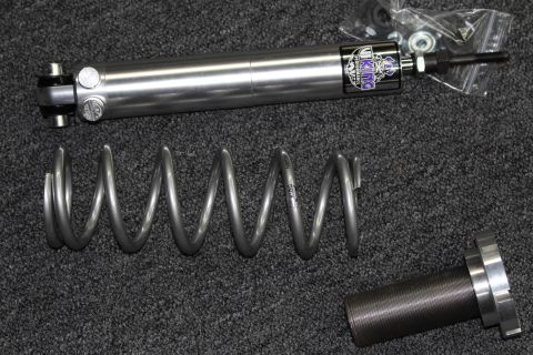 2003 Ford Crown Victoria - single Viking shock absorber with mounting hardware, a coil spring, and a threaded billet adjuster sleeve on dark gray carpet.