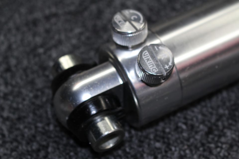 Polished coilover shock end with two Viking adjuster knobs and lower bushing mount