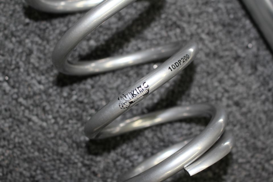 Silver coil spring with Viking logo and 10DP200 part marking printed on the coil