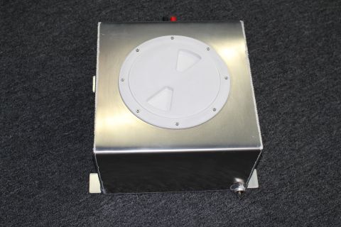 2003 Ford Crown Victoria - brushed aluminum fuel cell or surge tank fitted with a round white twist-lock access cap and small electrical terminal.