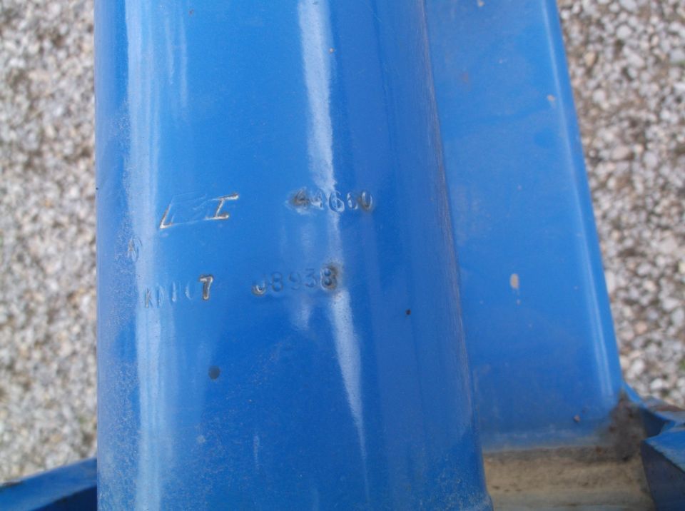 Blue metal frame with stamped numbers 'LI 7 08938' and '4660'
