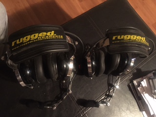 1986 Ford Bronco - Pair of Radios headsets shown with website address visible on the earcups.