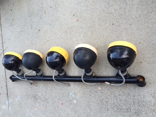 1986 Ford Bronco - KC lightbar with five lights, likely for an off-road vehicle.