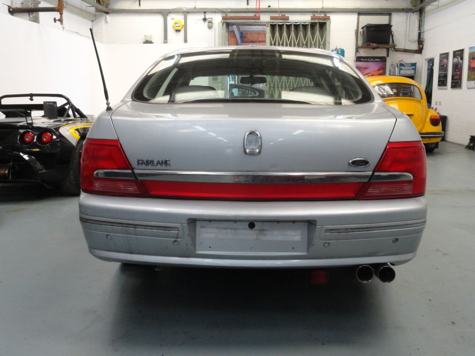 1999 Ford Fairlane rear view, silver sedan with 'FAIRLANE' badge