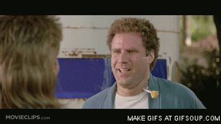 1995 Mercury Grand Marquis - A man with a corn cob in his mouth is speaking to another person, whose back is to the camera. The scene appears to be outdoors.