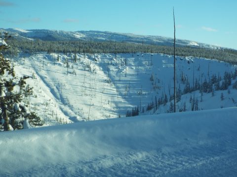 1994 Ford Bronco - Winter landscape photograph of a snow-covered valley and forested hills.