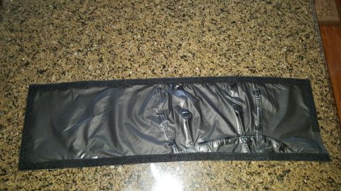 1996 Ford Bronco - Black winch cover with velcro edges, likely for a Ford Bronco.