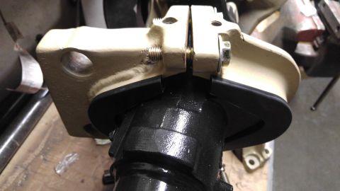 1991 Ford Bronco - A close-up view of a vehicle's suspension component, likely part of an axle assembly.