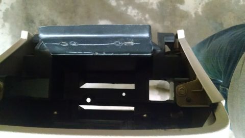 1994 Ford Bronco - This is a close-up view of a vehicle's interior part, possibly a bracket or housing.